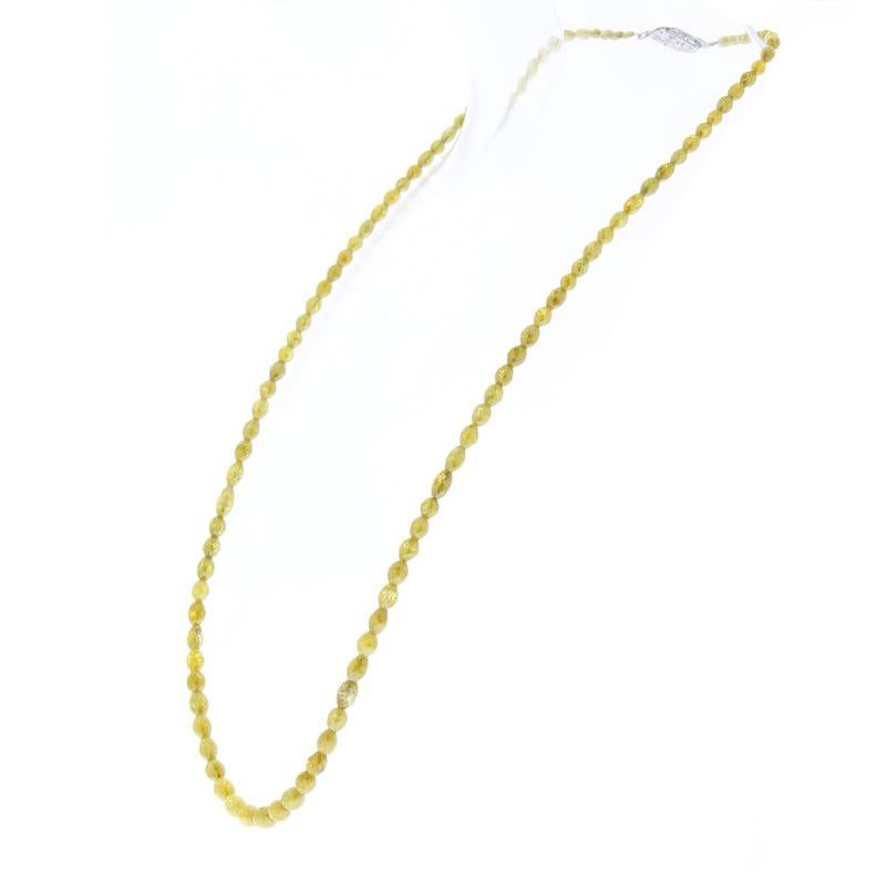 Perfect for anniversaries or birthday occasions, this gorgeous brightly polished 14 karat yellow gold eternity diamond necklace is truly one of a kind in luxury. A total of 103 rough bead diamonds are elegantly set around this spectacular custom