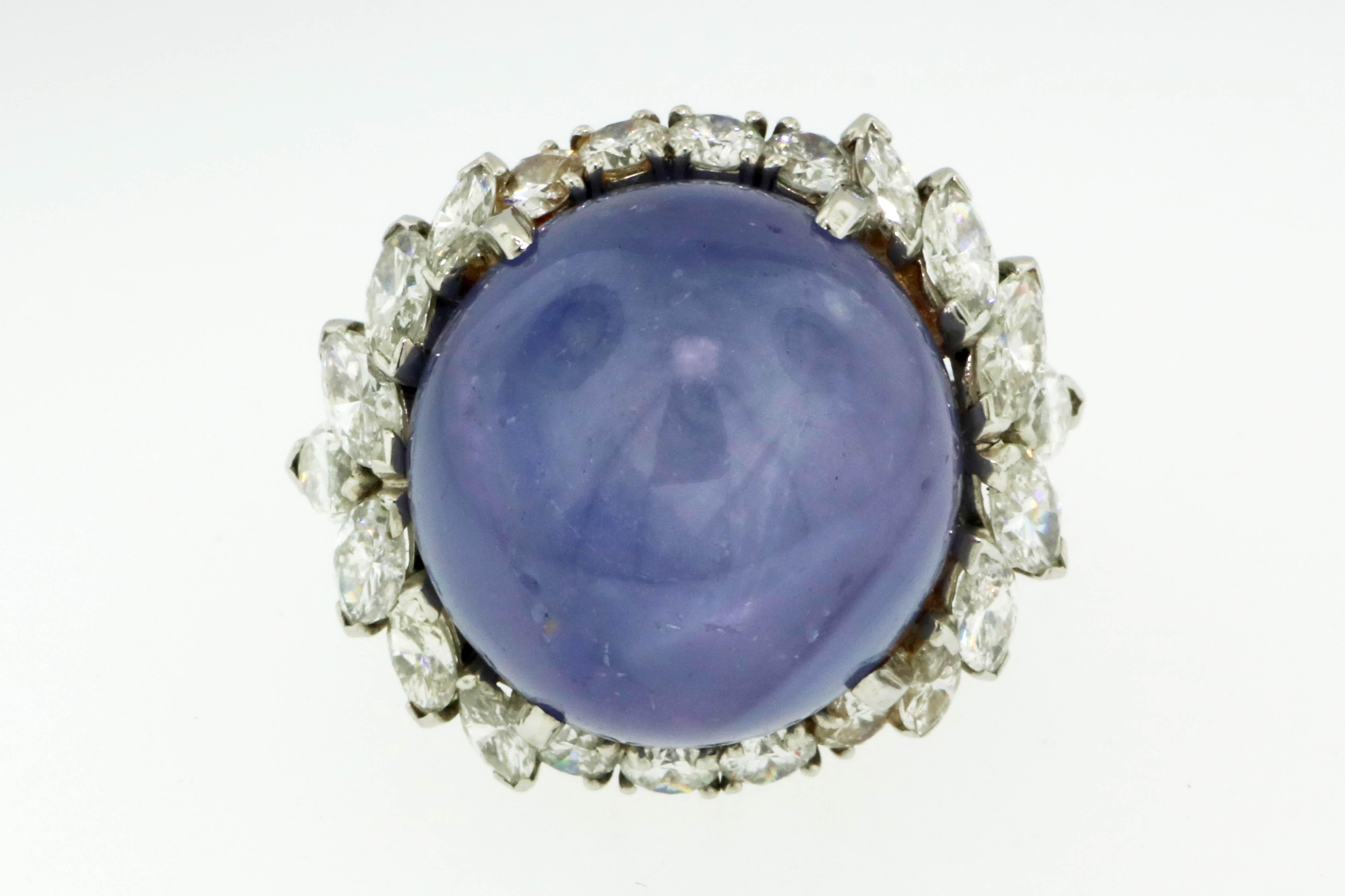 Contemporary 38 Carat Round Cabochon Star Sapphire Platinum Cocktail Ring with Diamond Halo