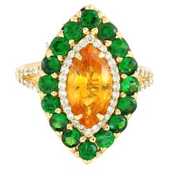 3.8 cts of Yellow Sapphire and Tsavorite and 1.03 cts of Diamonds Ring