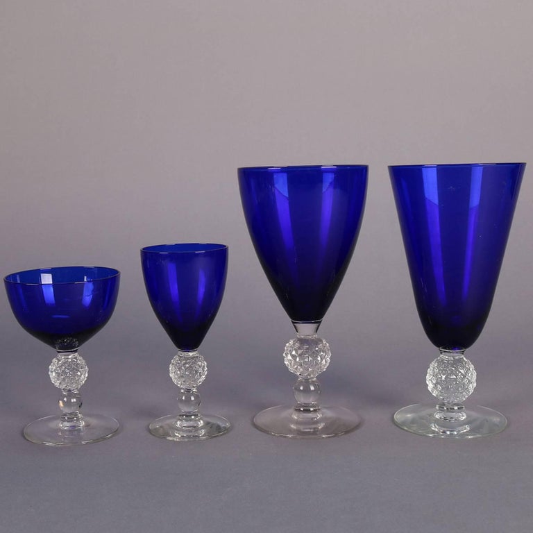 https://a.1stdibscdn.com/38-piece-set-of-ritz-blue-stemware-golf-ball-pattern-by-morgantown-glass-co-for-sale-picture-14/archivesE/upload/f_23963/1524075422816/IMG_6282_master.jpg?width=768
