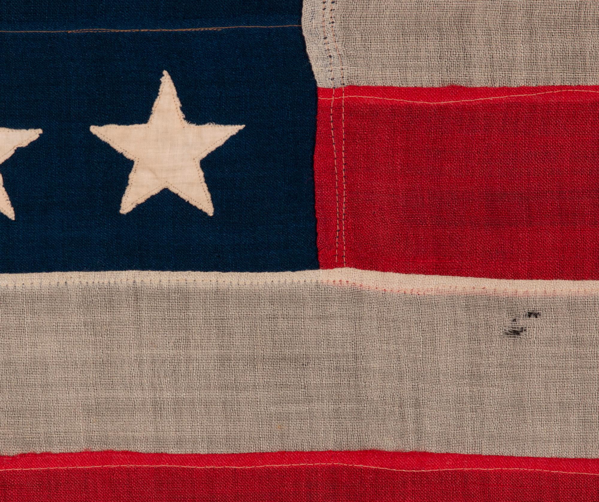 38 amerikanische Flagge mit Sternmotiv, Sterne in notiertem Muster, ca. 1876-1889 (19. Jahrhundert) im Angebot