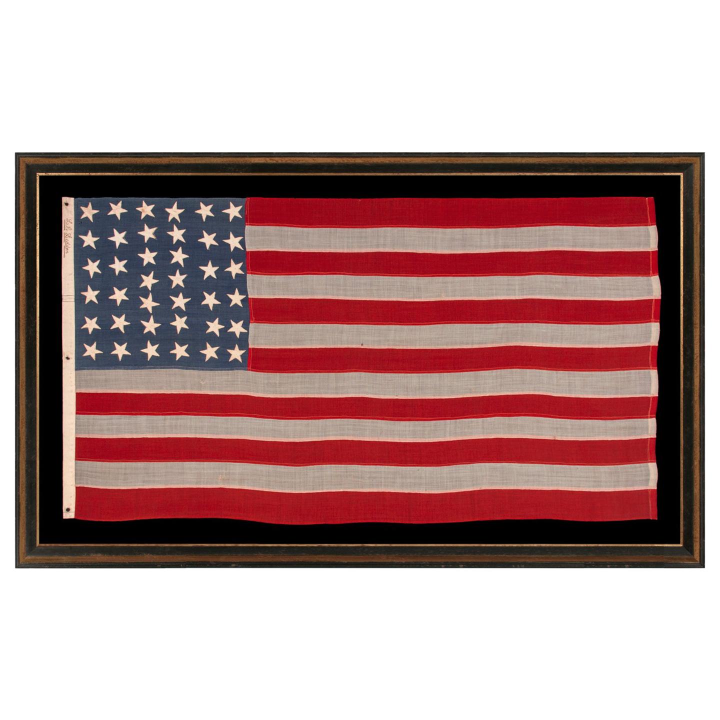 38 Star American Flag with Slate Blue Canton Signed "Leddon"