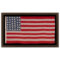 38 Star American Flag with Slate Blue Canton Signed "Leddon"