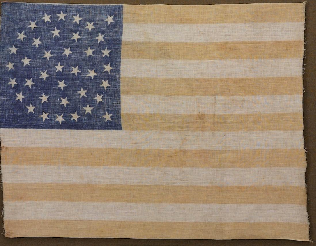 Late 19th Century 38-Star Medallion Pattern American Flag with Two Outliers, circa 1876