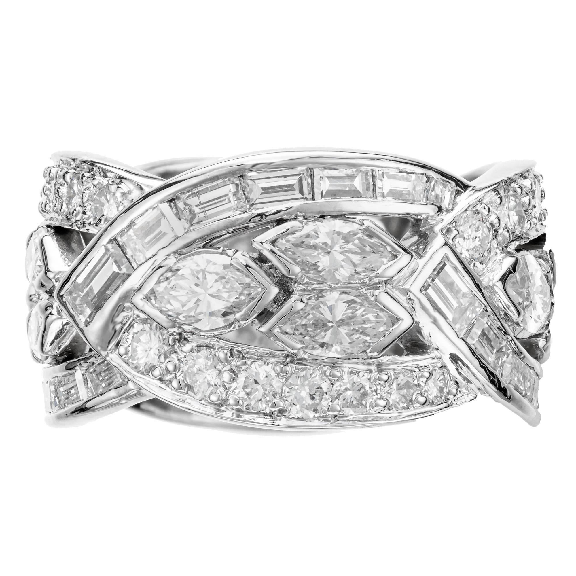 Vintage 1950's wide open work band ring. 12 marquise, 28 baguette and 28 round diamonds in a platinum setting. 

12 marquise diamonds, J VS-SI approx. 1.75cts
28 step cut baguette diamonds, I VS-SI approx. 1.45cts
28 round full cut diamonds, I VS-SI