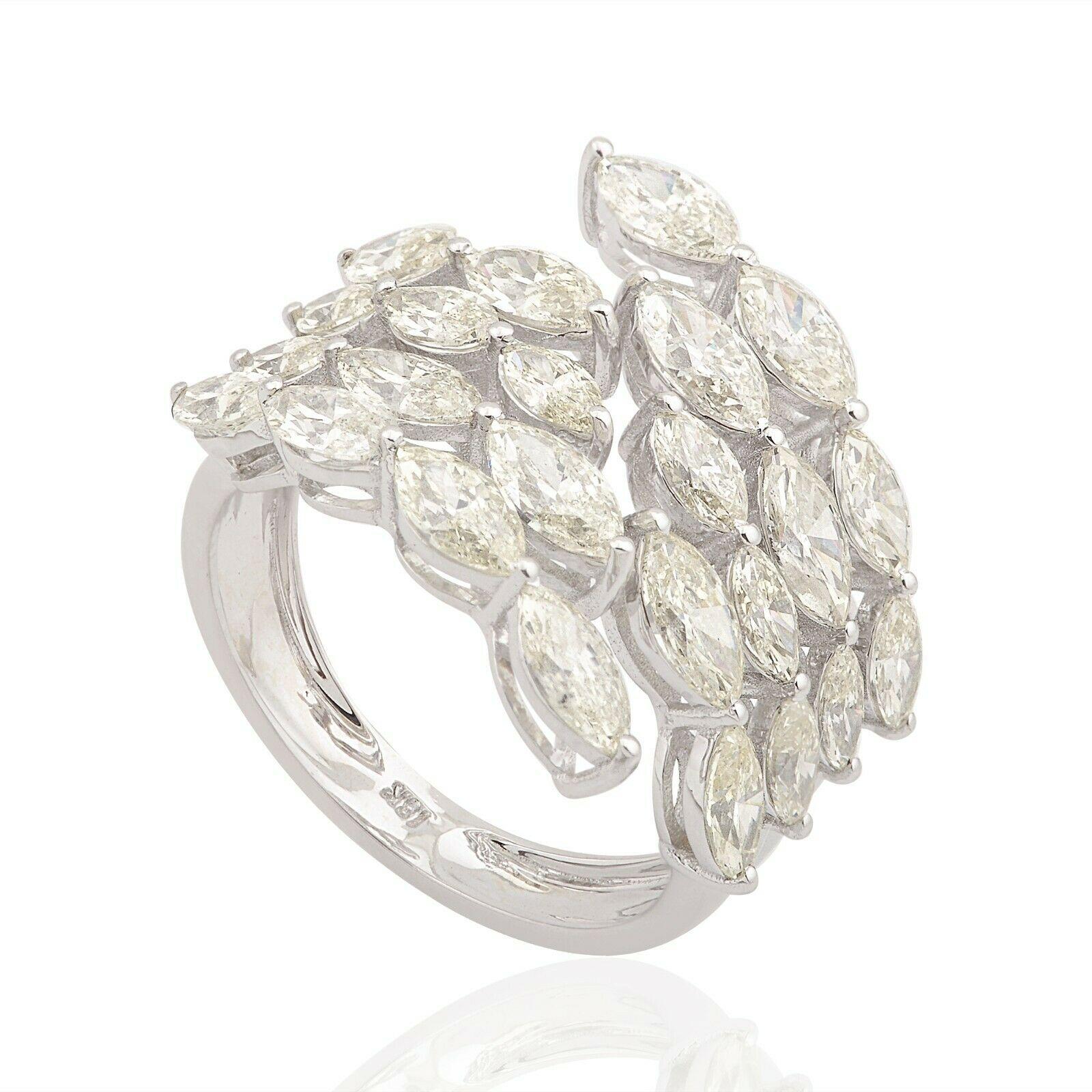 This ring has been meticulously crafted from 14-karat gold and set with 3.80 carats of sparkling marquise diamonds. Available in Rose, Yellow and White Gold

The ring is a size 7 and may be resized to larger or smaller upon request. 
FOLLOW  MEGHNA
