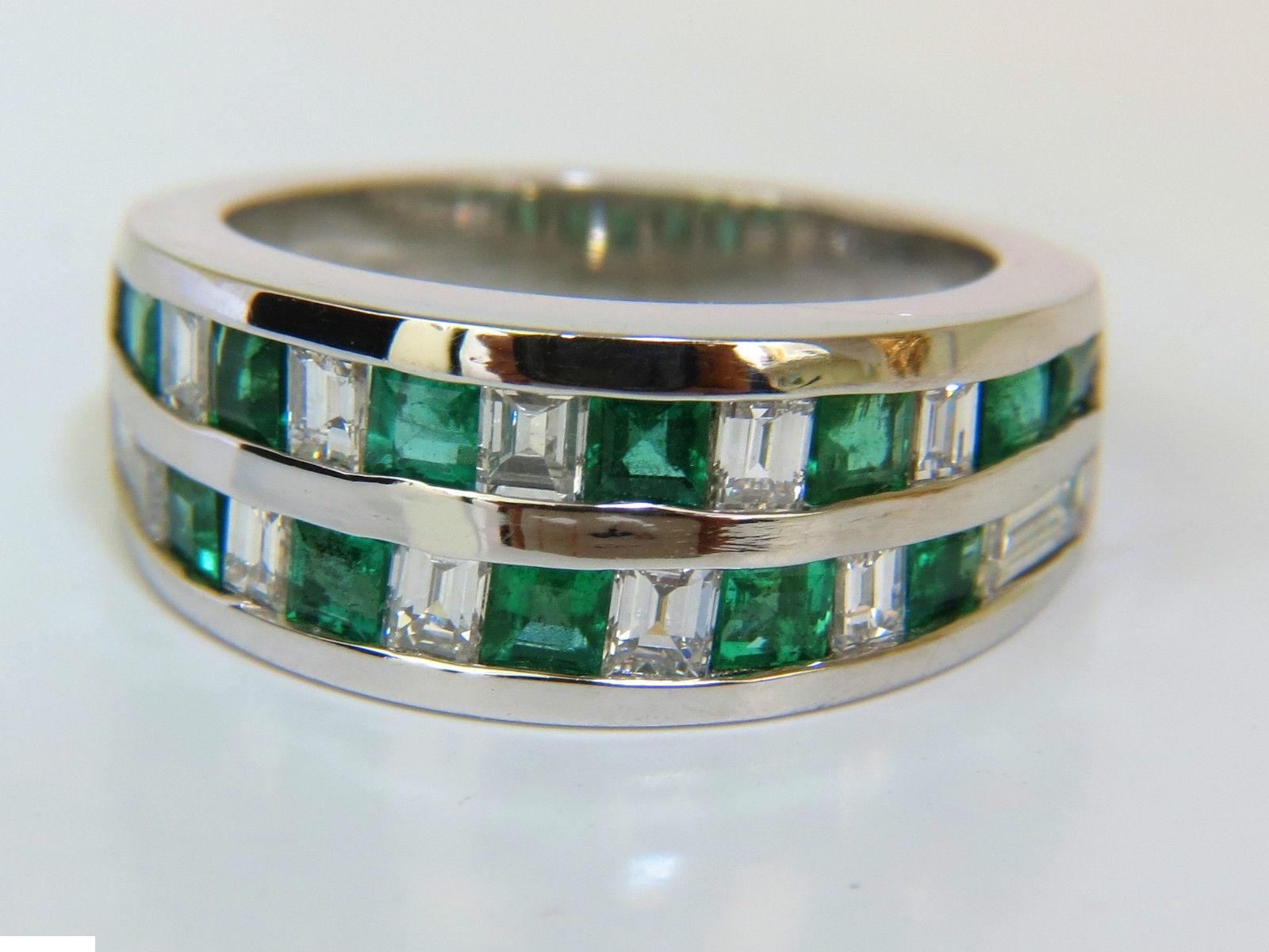 Platinum Classic

The 2-row modern band

1.80ct. Natural Emeralds

Vivid Green VS Clarity.

2.00ct. Diamonds: Vs-1 clarity, F-color.

Item: 15.9gms.

9.00mm thick

4.60mm (from skin to top of ring)

$6600 Appraisal to Accompany

Current size: 7

It