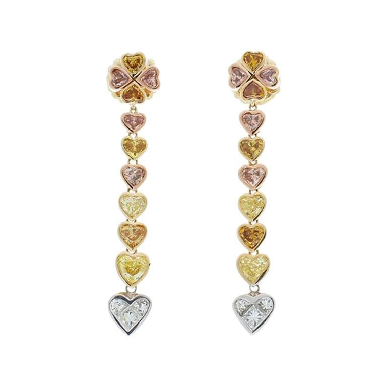 3.80 Carat Natural Fancy Colored Heart Shape Diamond Dual Tone Dangle Earrings For Sale
