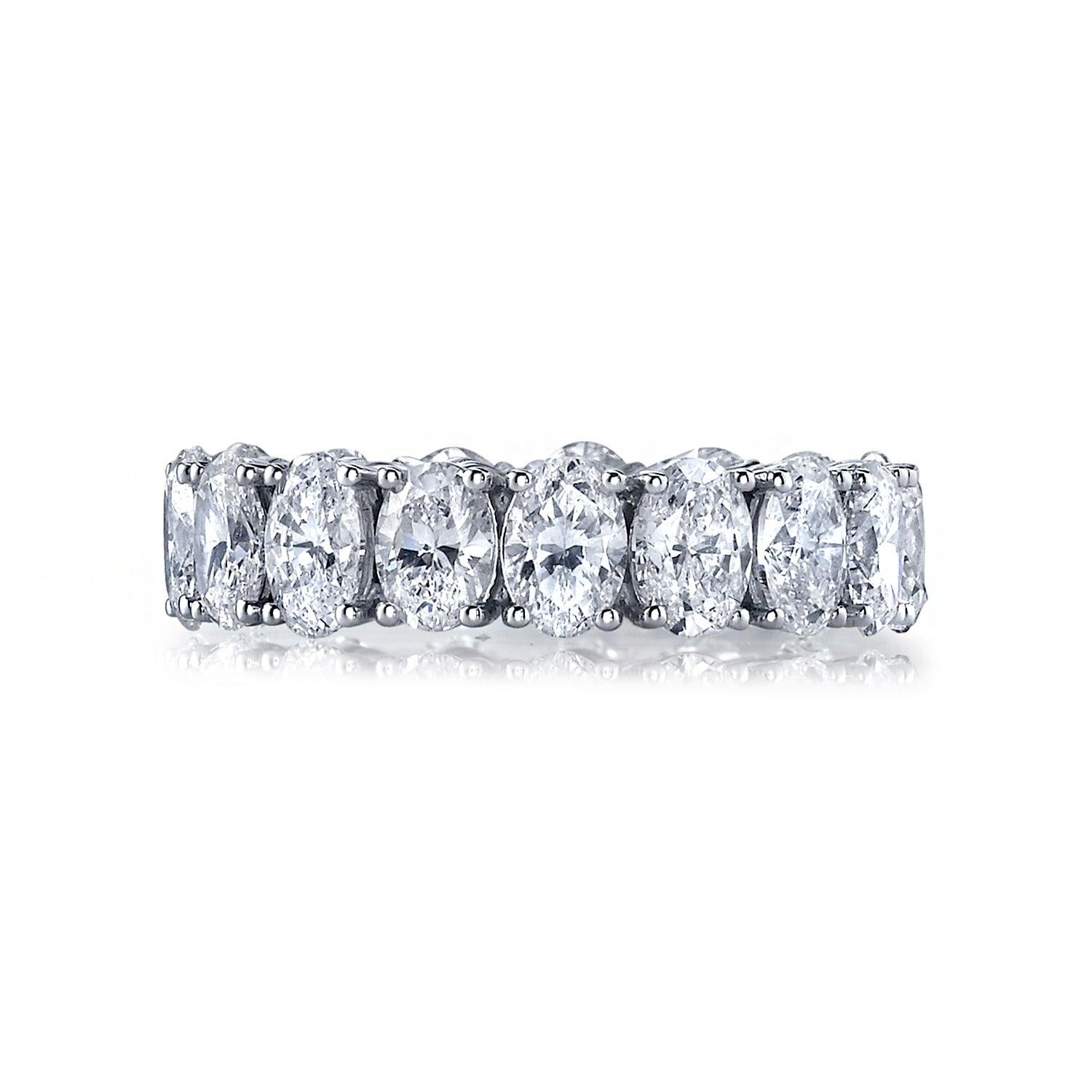 Up your style game with our Oval Diamond Cut Eternity Band! Featuring 19 radiant diamonds and a buttercup-adorned platinum band.  
Oval Diamond Cut Eternity Band.
This ring is created with 19 diamonds that total 3.80 carats. 
Their color is G/H with