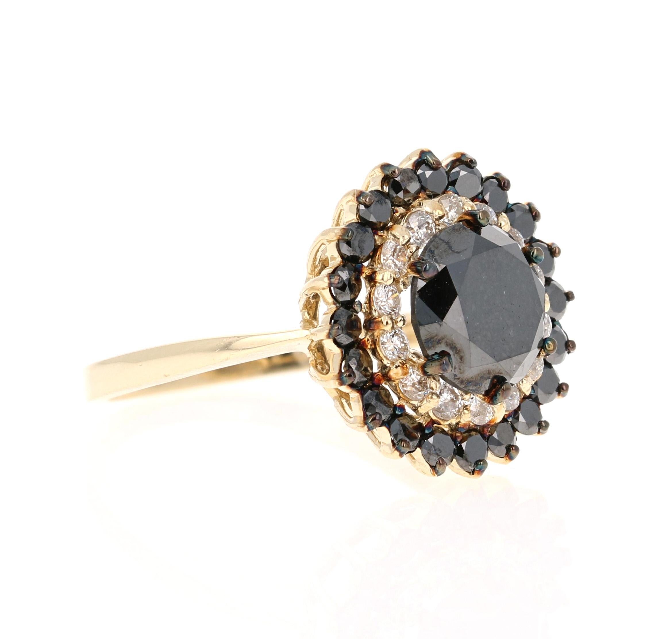 Gorgeous Black Diamond ring that can transform into an Engagement ring.  

There is a 2.69 Carat Round Cut Black Diamond in the center on the ring which is surrounded by 14 White Round Cut Diamonds that weigh 0.36 Carats (Clarity: SI, Color: F) and