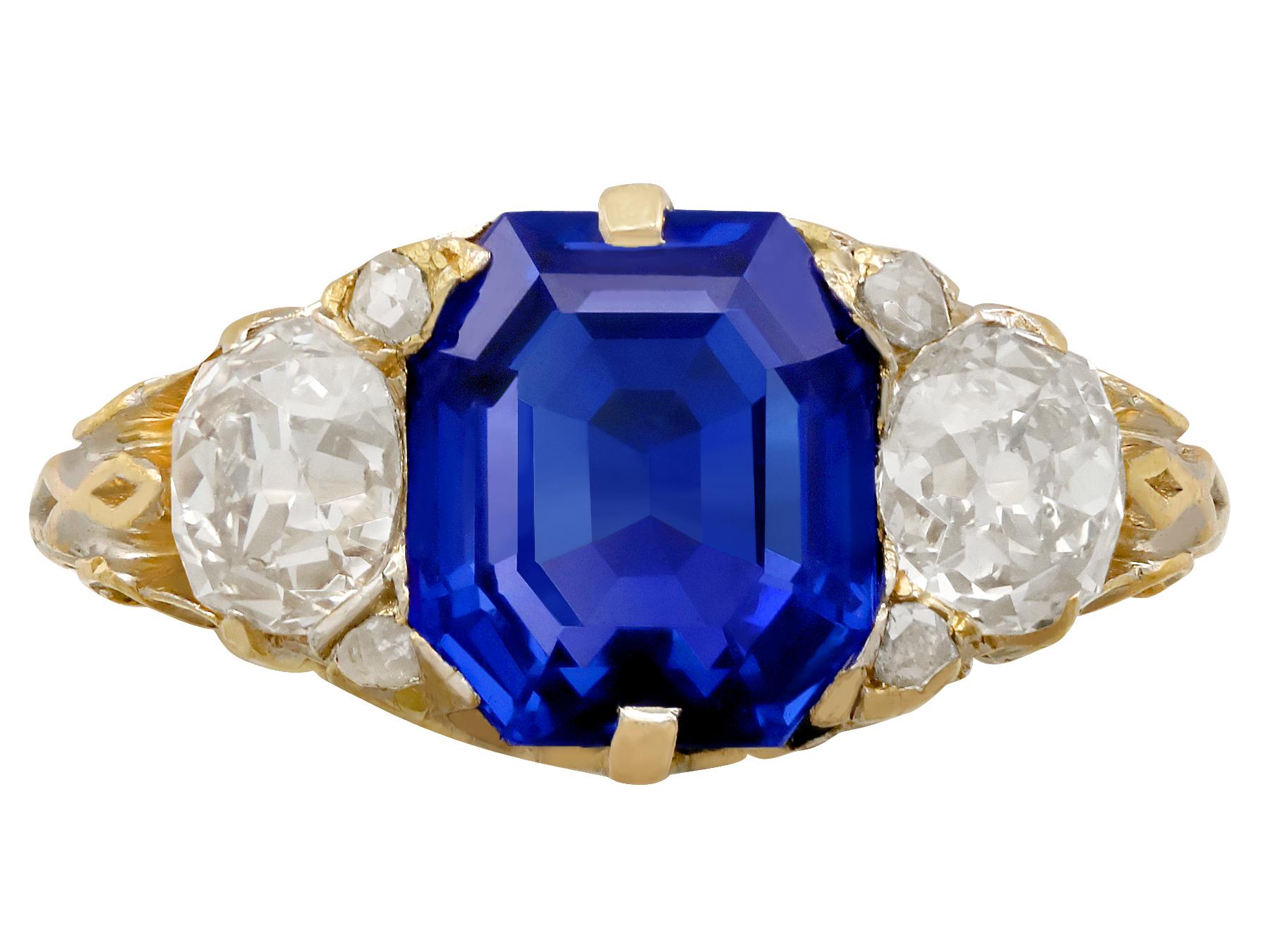 A stunning antique 3.80 carat natural Burmese sapphire and 1.48 carat diamond, 18 karat yellow and white gold trilogy ring; part of our diverse antique jewelry and estate jewelry collections.

This stunning, fine and impressive antique sapphire ring