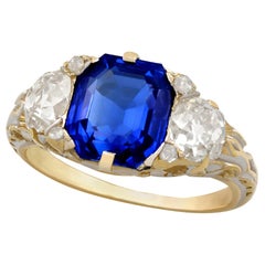 3.80 Carat Sapphire and 1.48 Carat Diamond Yellow and White Gold Trilogy Ring