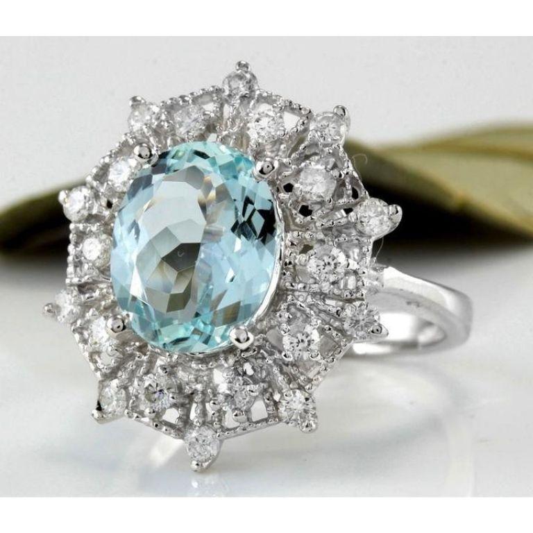 3.80 Carats Natural Aquamarine and Diamond 14K Solid White Gold Ring

Total Natural Oval Cut Aquamarine Weights: Approx. 3.00 Carats

Aquamarine Measures: 11 x 8.77mm

Aquamarine Treatment: Heating

Natural Round Diamonds Weight: Approx. 0.80 Carats