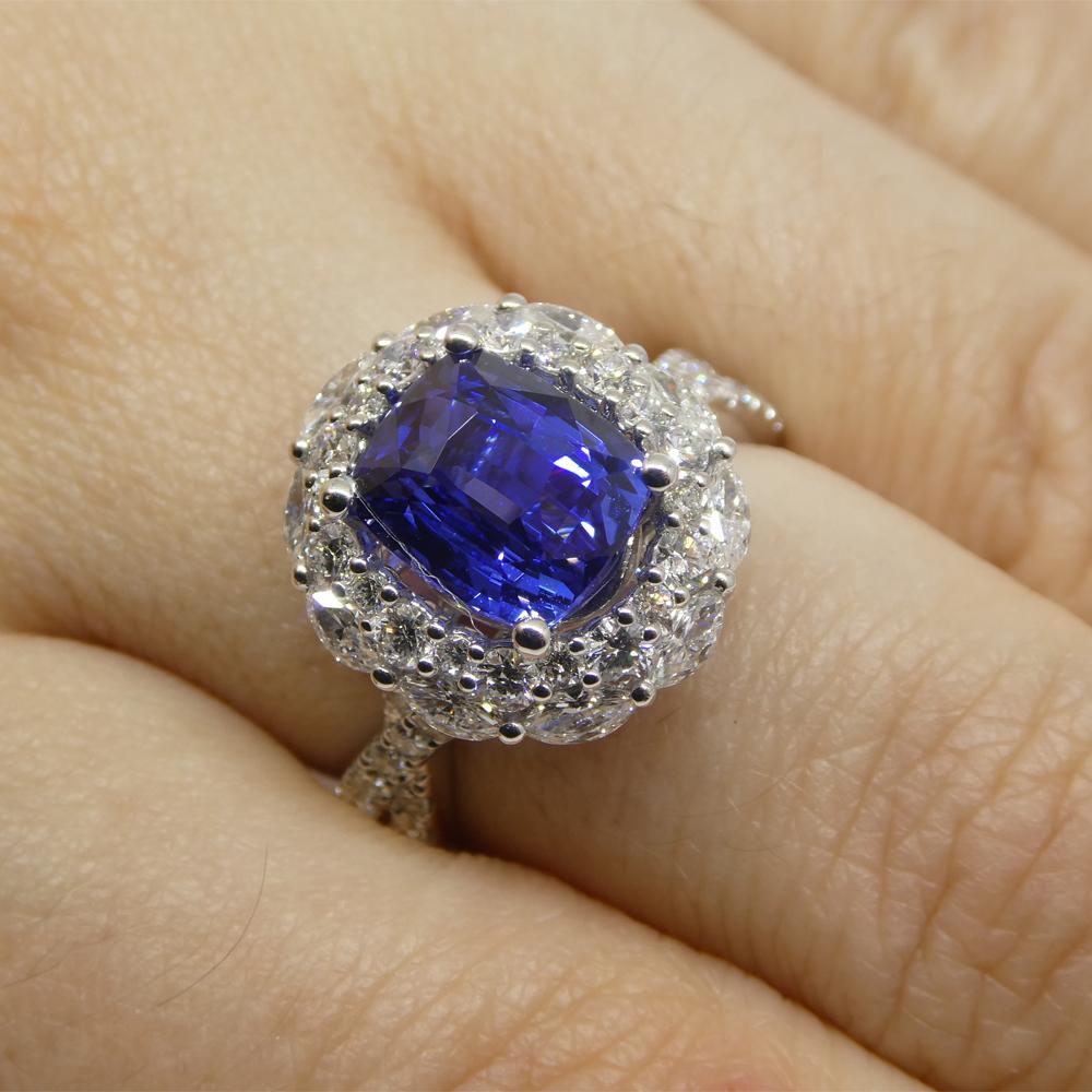 
Introducing our captivating Cushion-Cut Sapphire and Diamond Ring, an embodiment of timeless sophistication and allure. At its heart rests a mesmerizing cushion-cut sapphire, weighing 3.80 carats. This sapphire, renowned for its transparency and