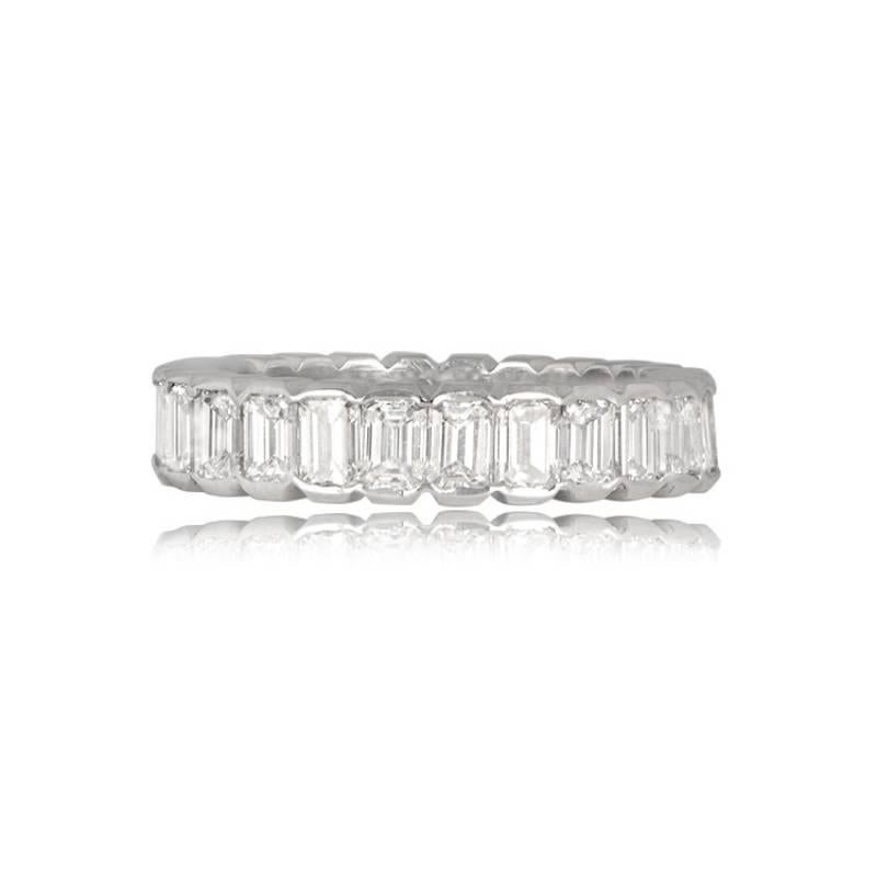 A stunning emerald-cut diamond band featuring approximately 3.80 carats of diamonds set in half-bezels. The diamonds boast G-H color and VS1-VS2 clarity, radiating exceptional brilliance. This exquisite band is meticulously hand-crafted in platinum,