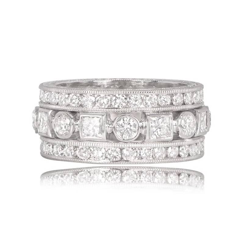 An exquisite estate-style diamond wedding band featuring a total diamond weight of 3.80 carats. The center row showcases alternating princess cut and brilliant-cut diamonds, each bezel-set in a platinum setting. Outer rows are elegantly channel-set.