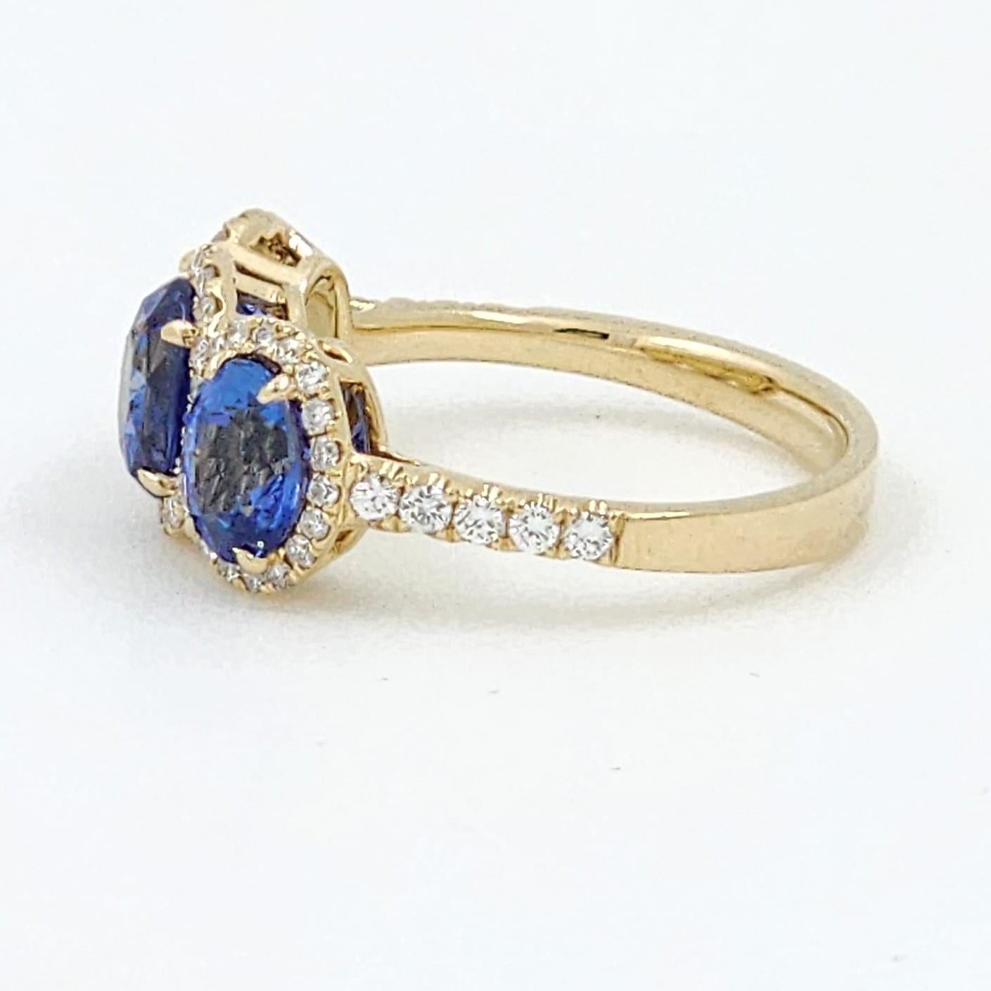 Oval Cut 3.81 Carat Blue Sapphire and Diamond Ring in 14 Karat Yellow Gold For Sale