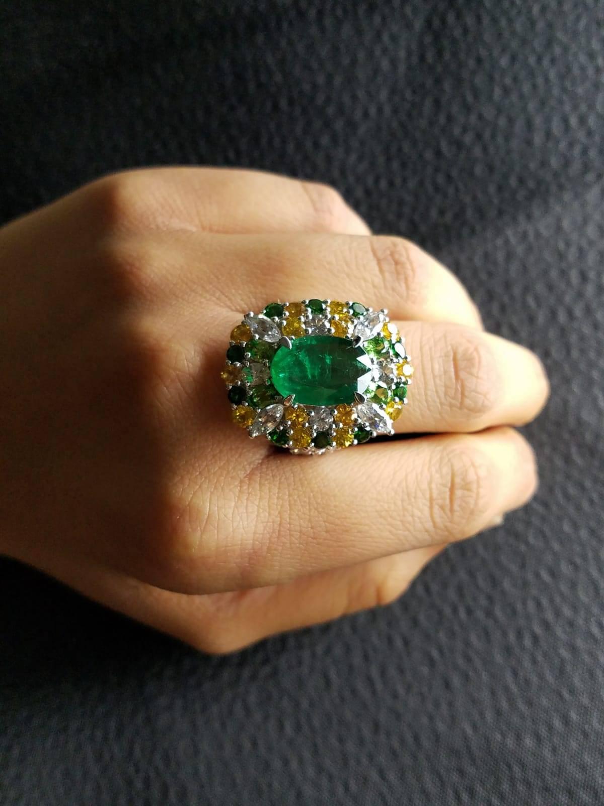 Women's 3.81 Carat Emerald and Colored Sapphire 18 Karat Gold Cocktail Ring