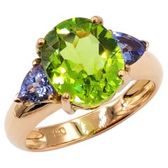 3.81 Carat Peridot Tanzanite Three-Stone Rose Gold Ring