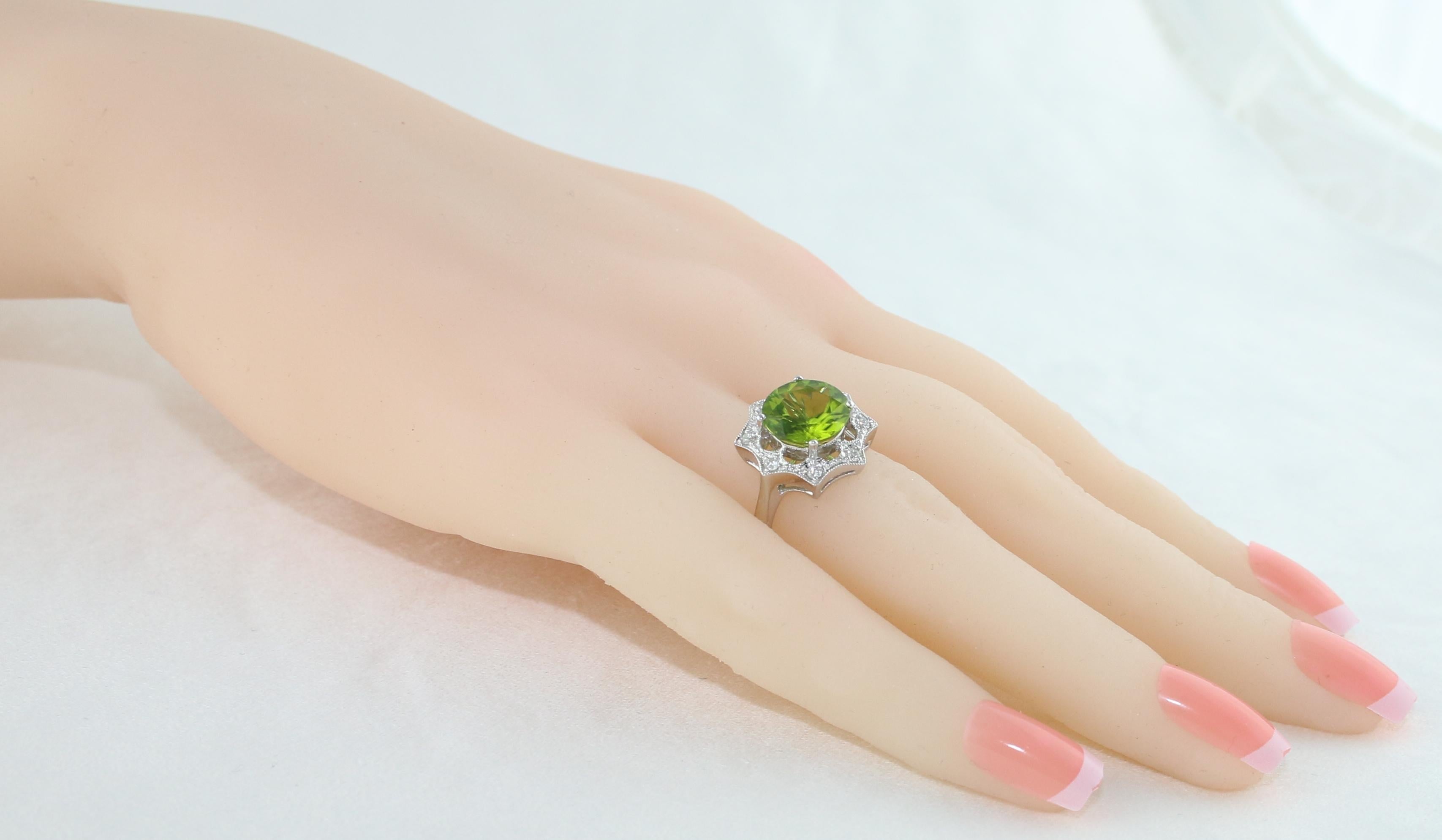 Round Cut 3.81 Carat Round Peridot and Diamond Gold Ring For Sale