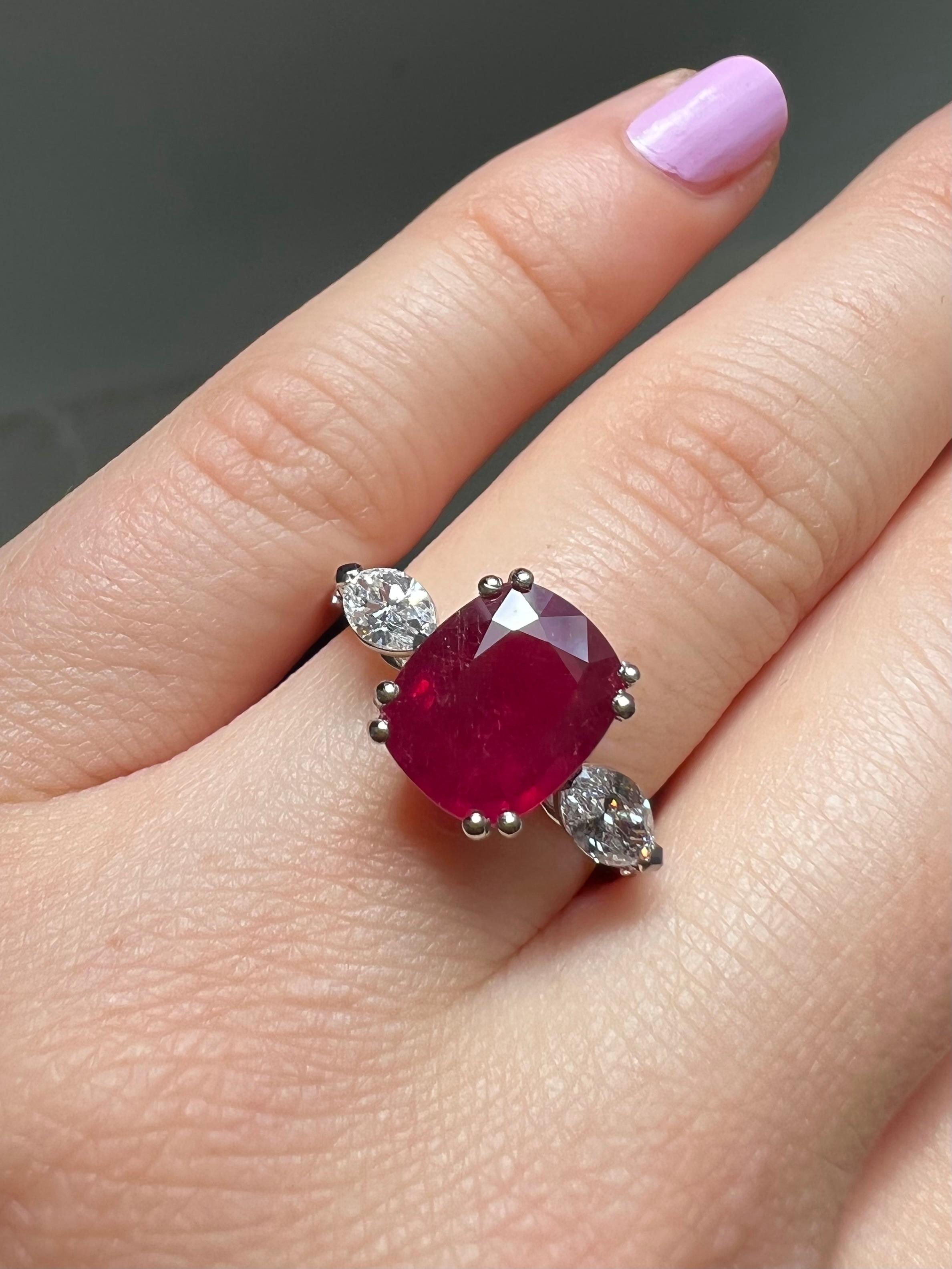 Ruby Weight: 3.81 CTS
Diamond Weight: 0.78 CT
Metal: Platinum
Ring Size: 7
Shape: Cushion
Color: Red
Hardness: 9
Birthstone: July