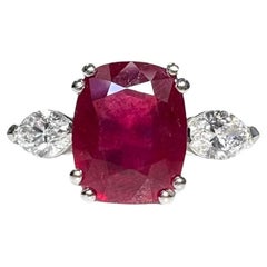 3.81 Carat Ruby Cushion Three Stone Ring Marquise Diamonds