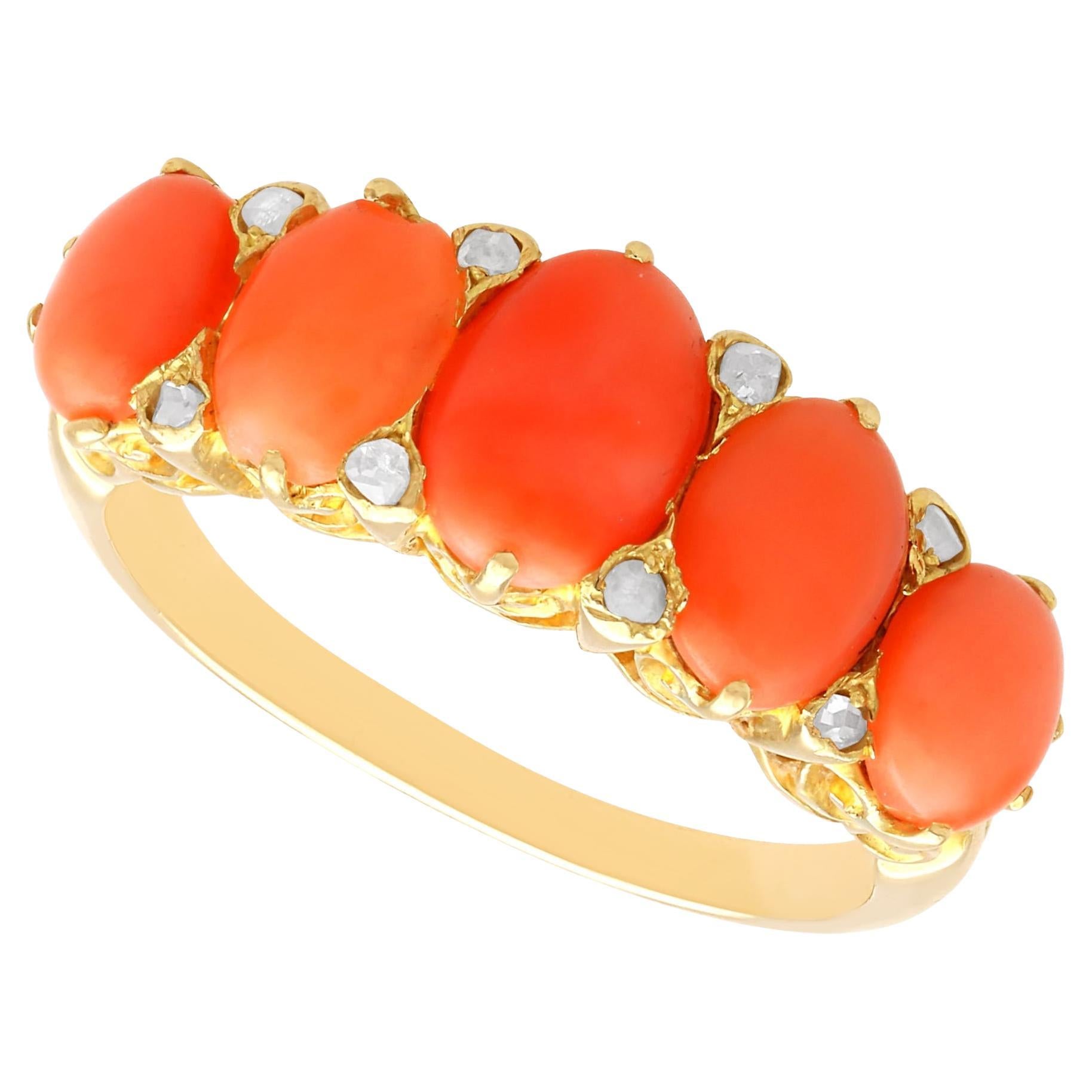 Anillo de coral de 3,82 quilates y diamantes de 0,16 quilates y cinco piedras de oro amarillo de 18 quilates