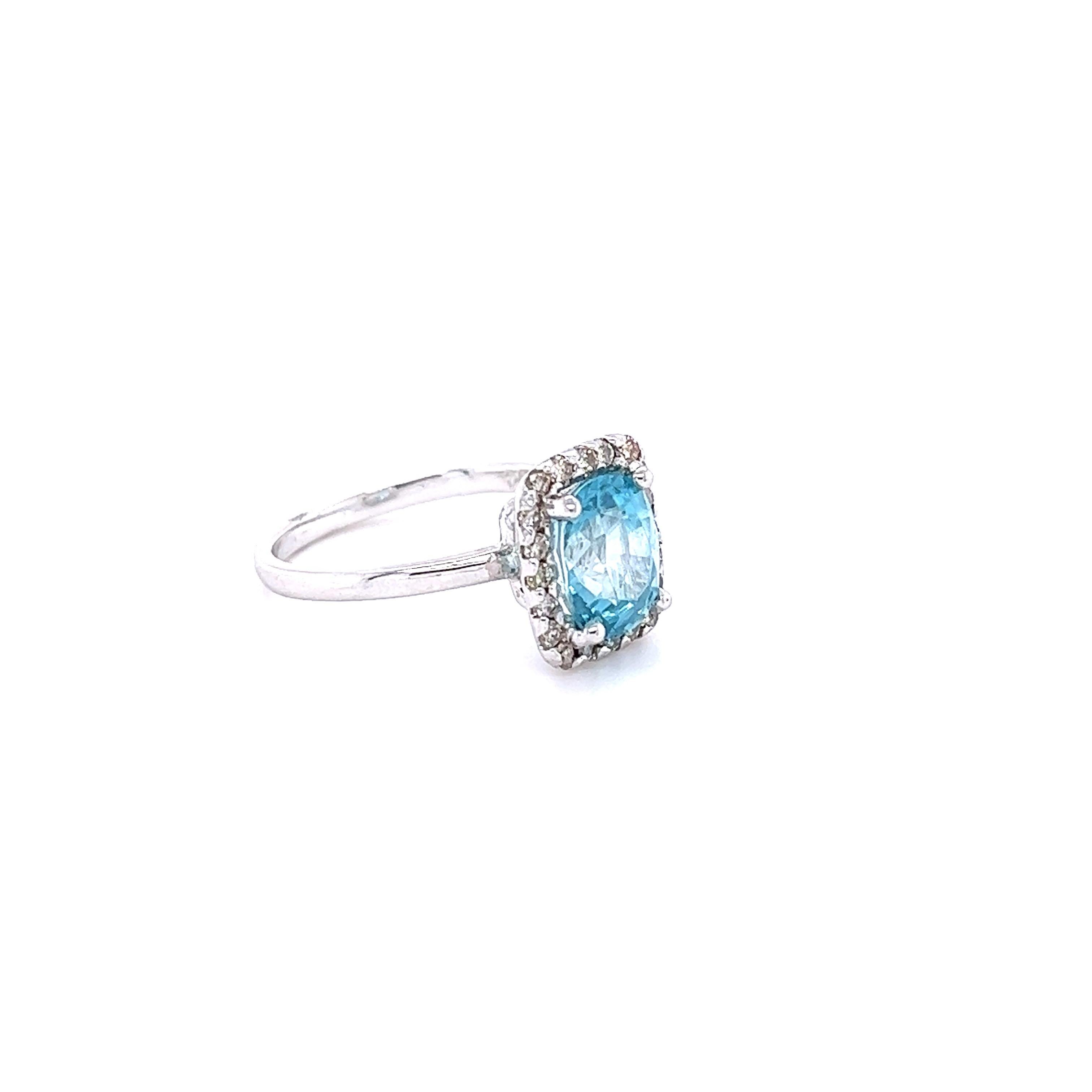 Blue Zircon is a natural stone mined mainly in Sri Lanka, Myanmar, and Australia.  
This ring has a Oval Cut Blue Zircon that weighs 3.09 carats measures at 9 mm x 7 mm. It is surrounded by Natural Round Cut Diamonds that weigh 0.33 Carats. Clarity: