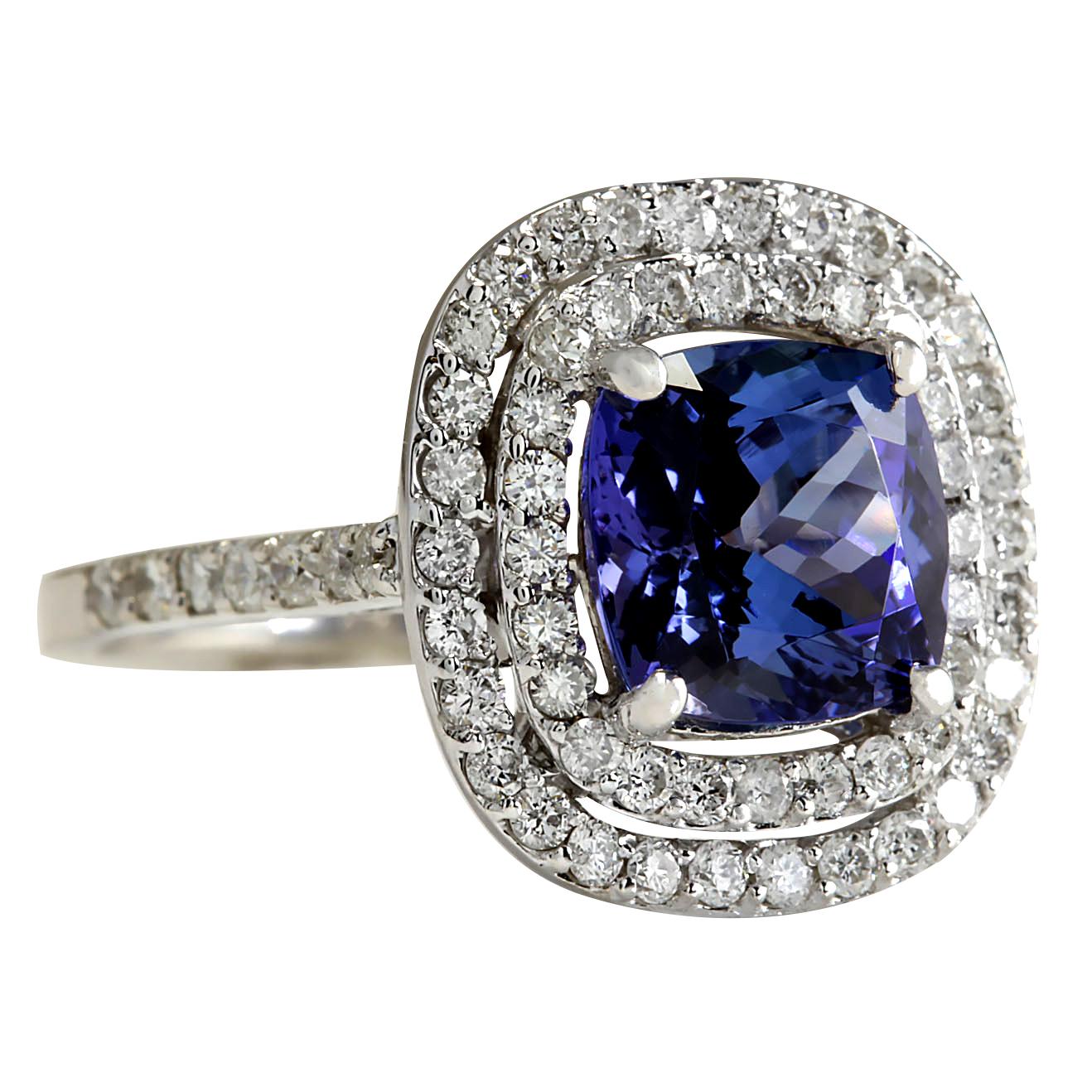 3.82 Carat Natural Tanzanite 14 Karat White Gold Diamond Ring
Stamped: 14K White Gold
Total Ring Weight: 5.0 Grams
Total Natural Tanzanite Weight is 2.92 Carat (Measures: 8.50x8.50 mm)
Color: Blue
Total Natural Diamond Weight is 0.90 Carat
Color: