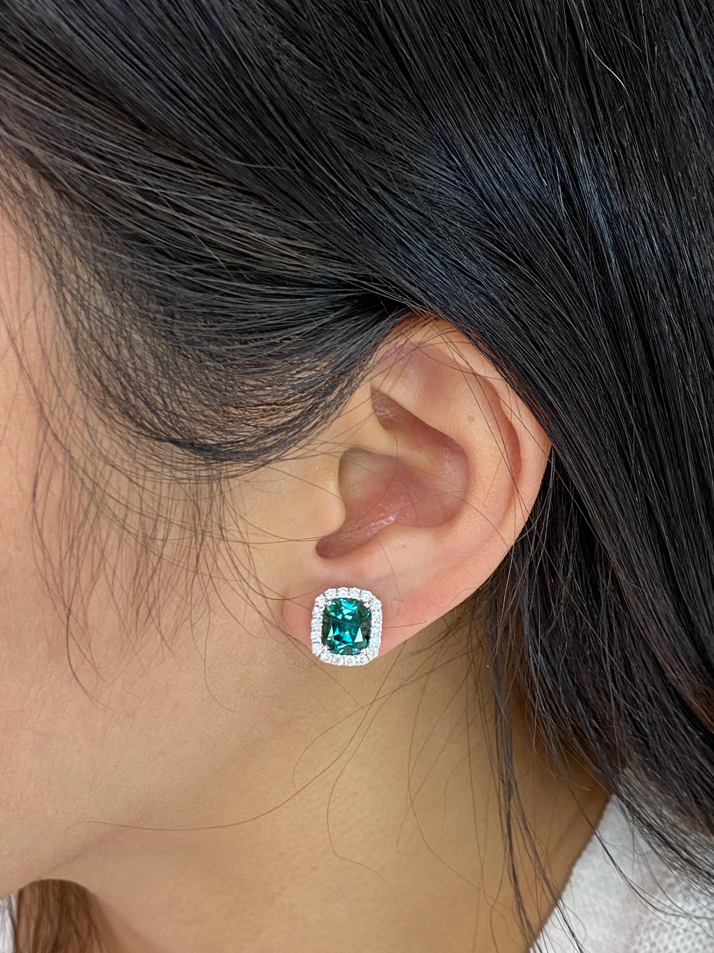 The color is unbelievable! Ask for a video. This is an eye catching piece! Here is a nice natural vivid green tourmaline and diamond earrings. The natural tourmaline is full of life. A color that is hard to find and hard to forget. It is not treated