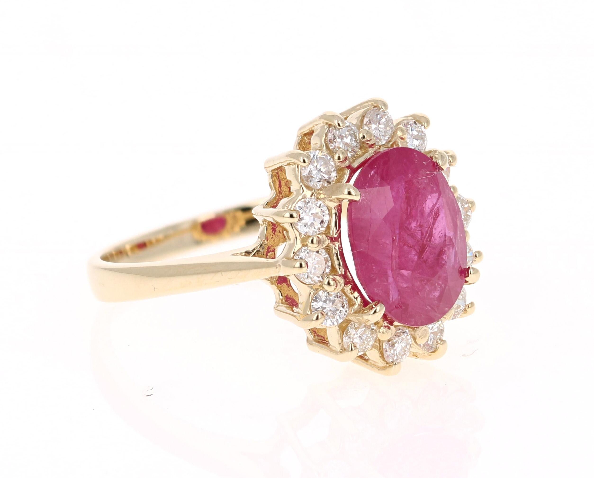 Simply beautiful Ballerina Ruby Diamond Ring with a Oval Cut 3.27 Carat Ruby which is surrounded by 14 Round Cut Diamonds that weigh 0.55 carats. The total carat weight of the ring is 3.82 carats. The clarity and color of the diamonds are SI-F. The