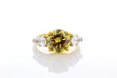 3.82 Carat Round Natural Fancy Deep Yellow VVS2 3-Stone Ring 22 Karat Gold Plat