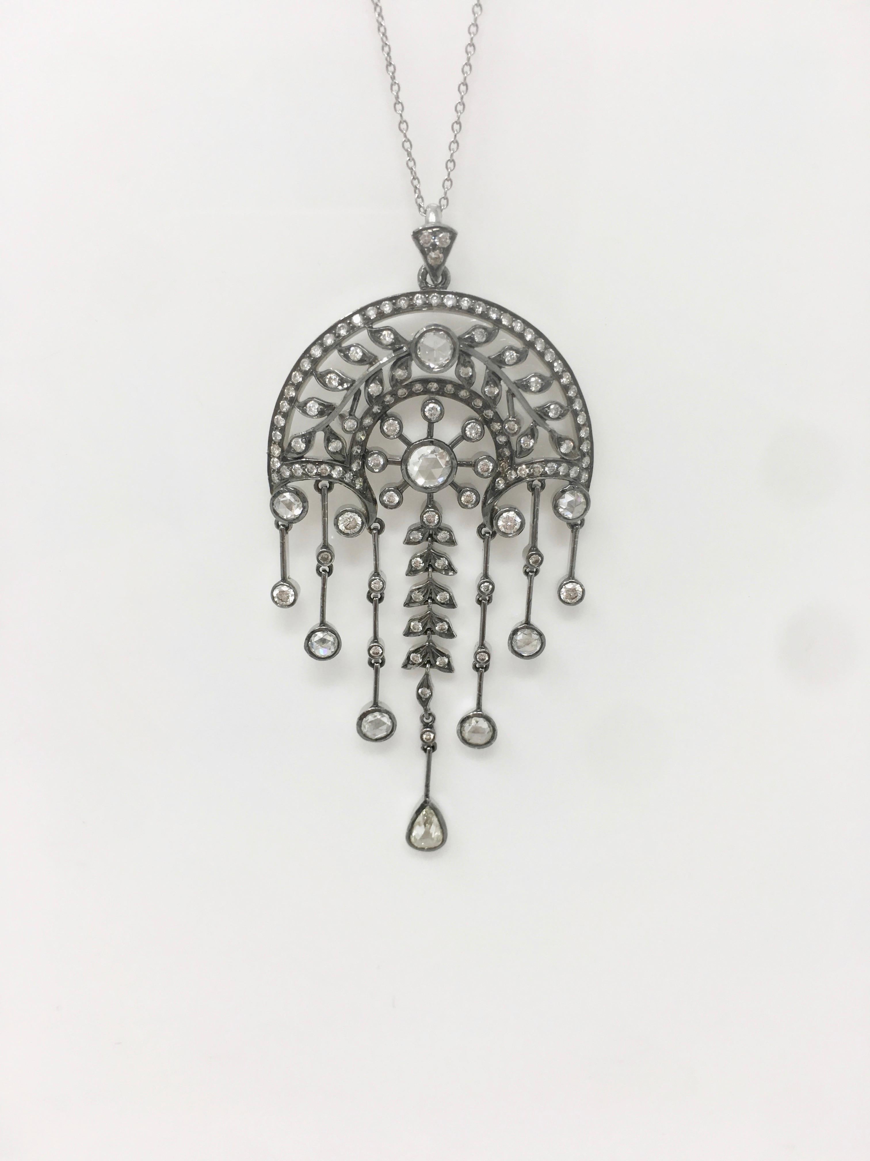 An attractive and elegant rose cut diamond and round brilliant cut diamond pendant hand crafted  by Moguldiam Inc in polish black 18k white gold (black rhodium ) . The total diamond weight on the pendant is 3.82 carat with H I color and VS clarity.