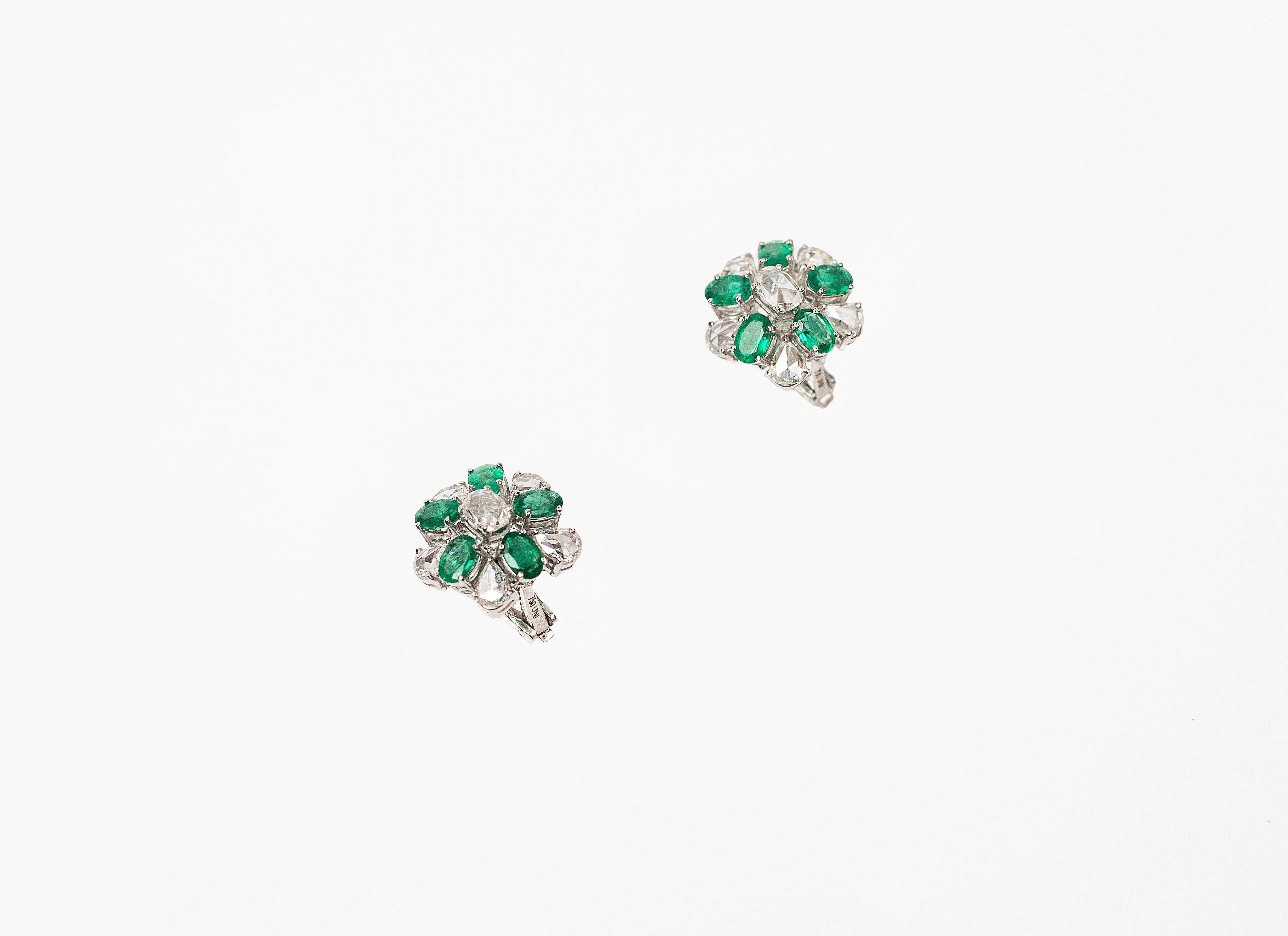Handcrafted Rose Cut Diamond and Natural Emerald Earrings Studs in 18K Gold.
Gold Weight - 11.634 gms
Diamond Clarity - VS
Diamond Colour - F-G
Emerald  - Natural
Post and Clip System
