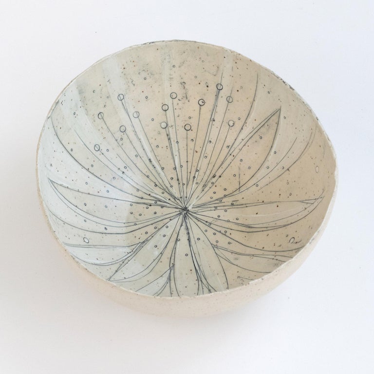 382 Hand Crafted Springing Stoneware Bowl by Helen Prior

A delicate hand-crafted bowl, organic in shape with a torn clay opening in natural speckled stoneware clay.
Part of the Cross Pollination Series- the stylizing and abstraction of elements