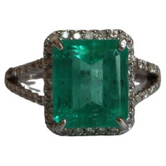 Used GIA Certified 3.82Ct Colombian Emerald Halo Ring in Platinum900