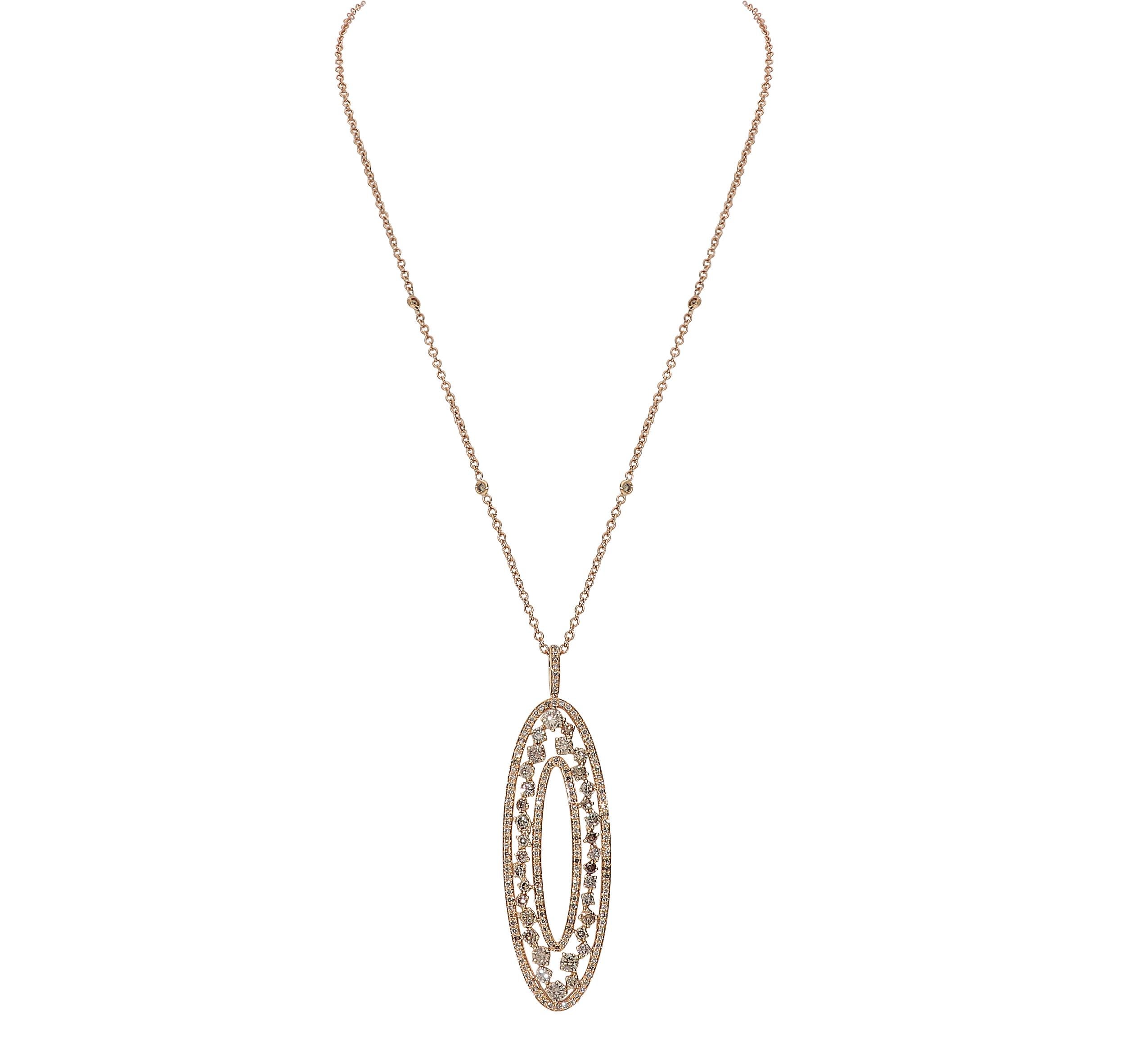 Long chain with oval shaped pendant with 3.83 carats of brown round diamonds. 
The weight of 18karat rose gold is 13.20 grams. The chain has a total length of 46centimeters adjustable to 43centimeters. Features a large pendant 2centimeters x