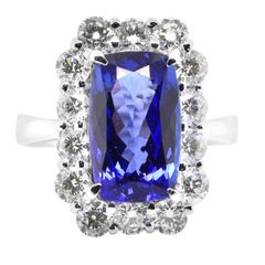 3.83 Carat, Natural Tanzanite and Diamond Halo Ring Set in Platinum