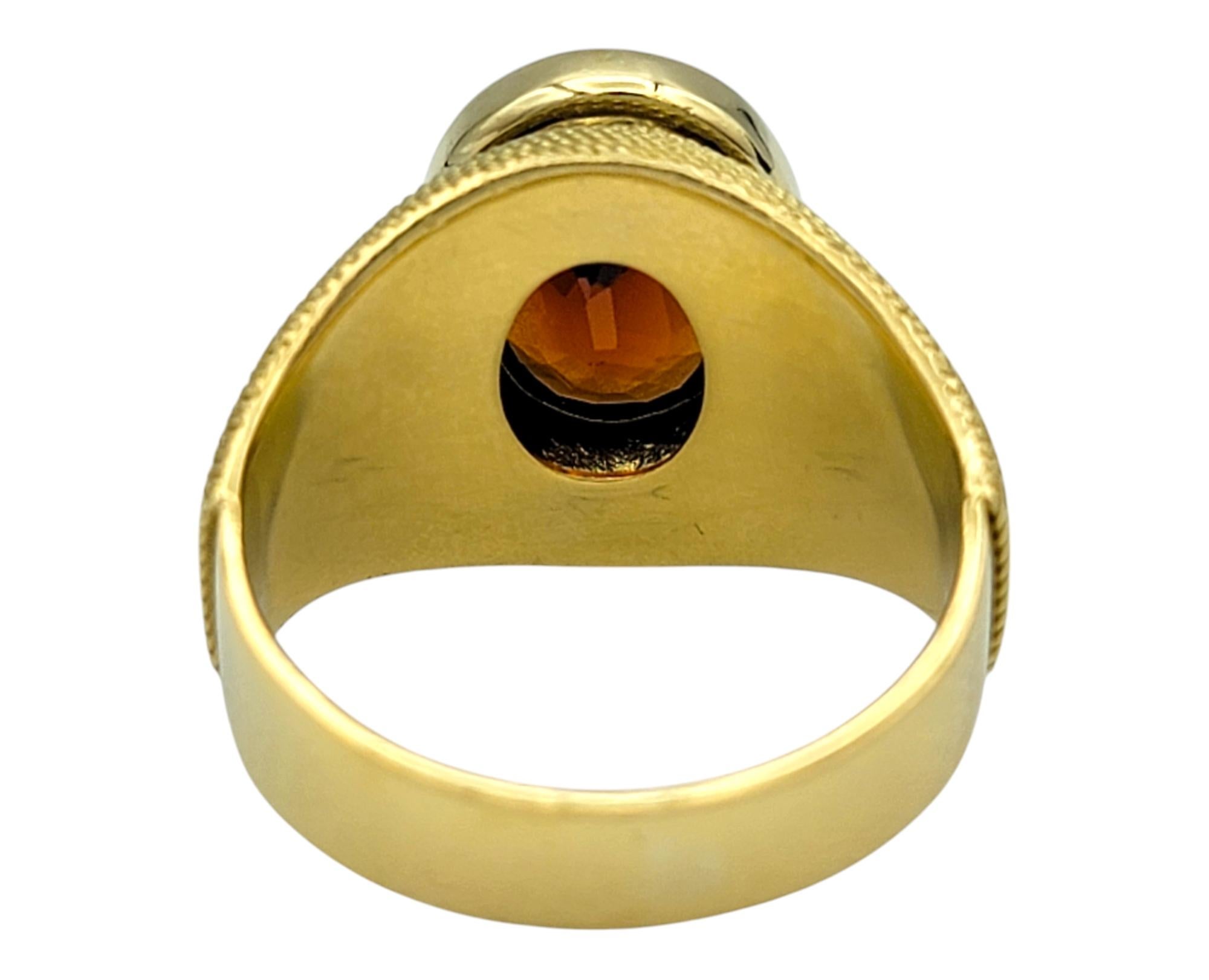 Women's or Men's 3.83 Carat Oval Cut Spessartite Garnet Ring in Textured 18 Karat Yellow Gold For Sale