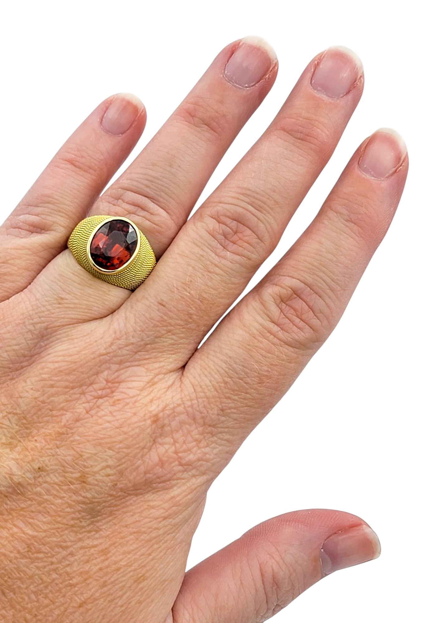 3.83 Carat Oval Cut Spessartite Garnet Ring in Textured 18 Karat Yellow Gold For Sale 2