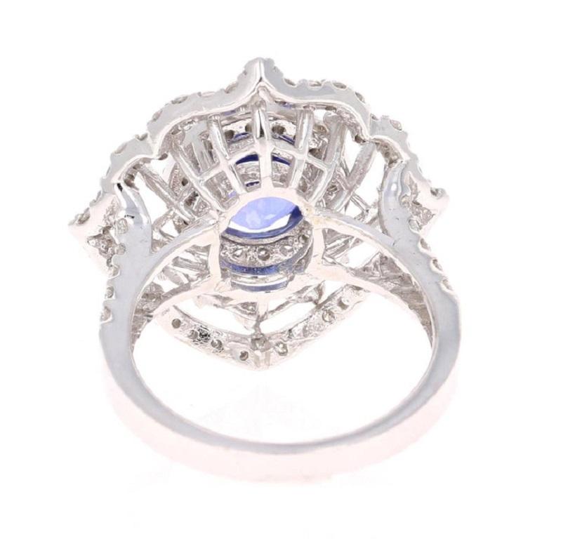 Taille ovale Bague cocktail en or blanc 14 carats avec tanzanite de 3,83 carats et diamant en vente