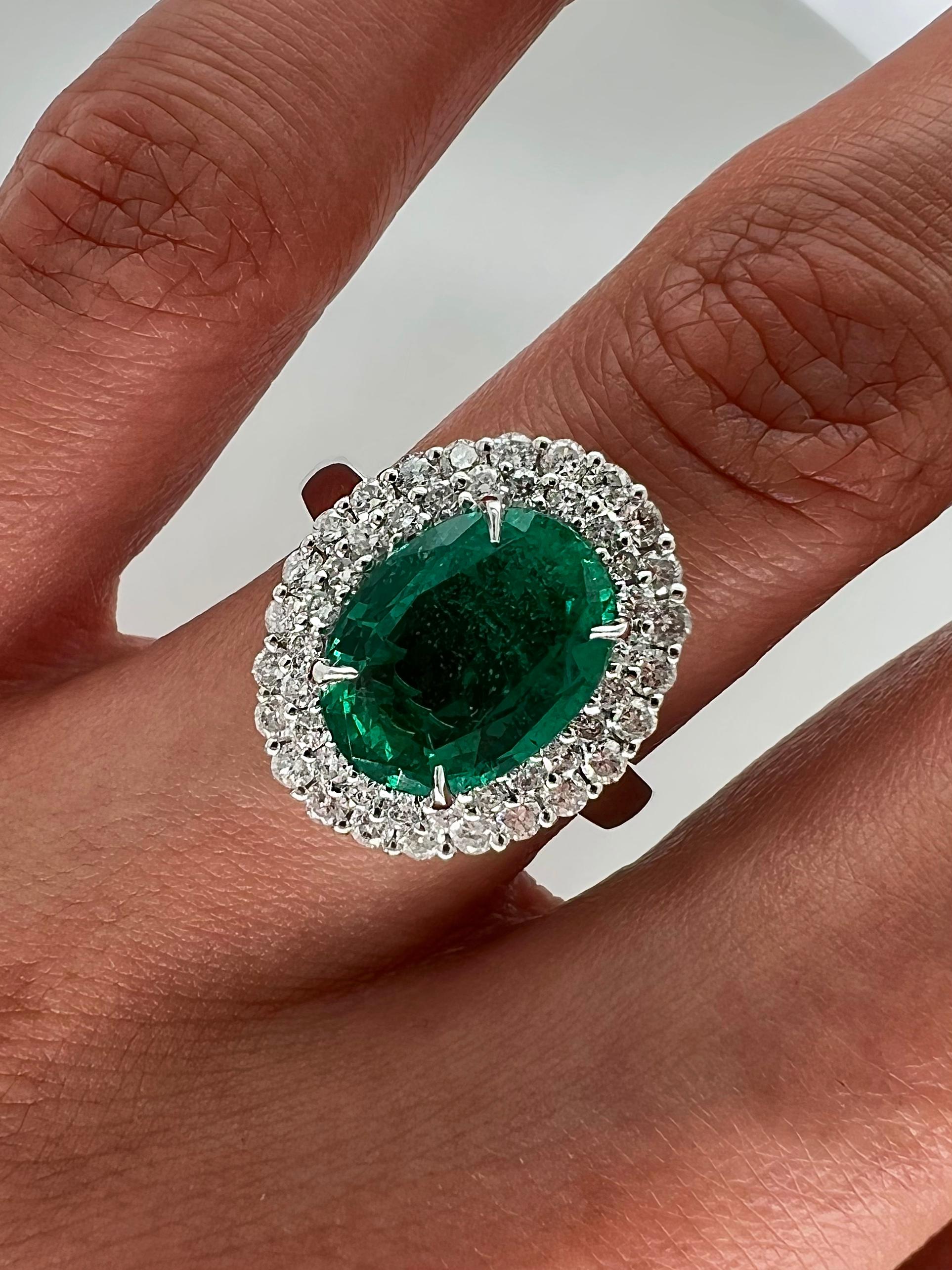 Oval Cut 3.83 Total Carat Green Emerald and Diamond Engagement Ring For Sale