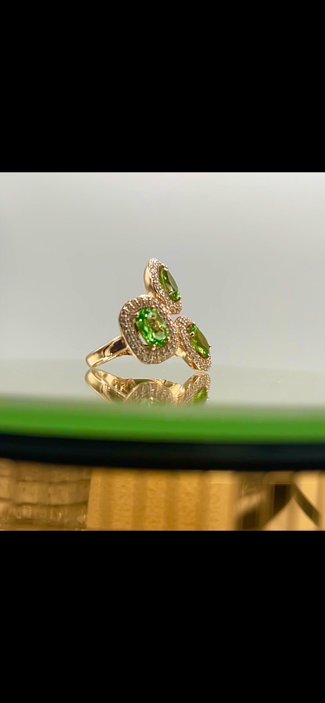 Contemporary 3.84 Carat Three-Stone Tsavorite And Diamond Rose Gold Cocktail Ring For Sale