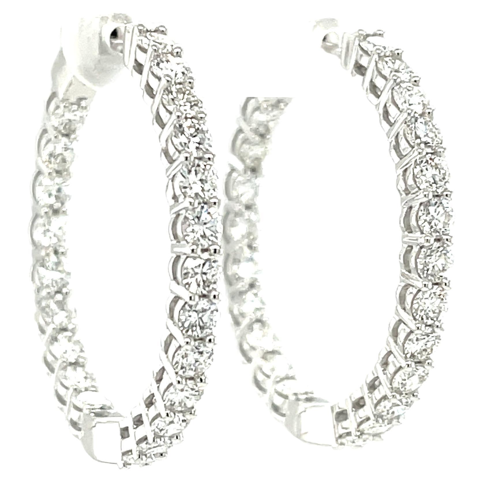These spectacular diamond hoops are a classic that will never go out of style! With the 