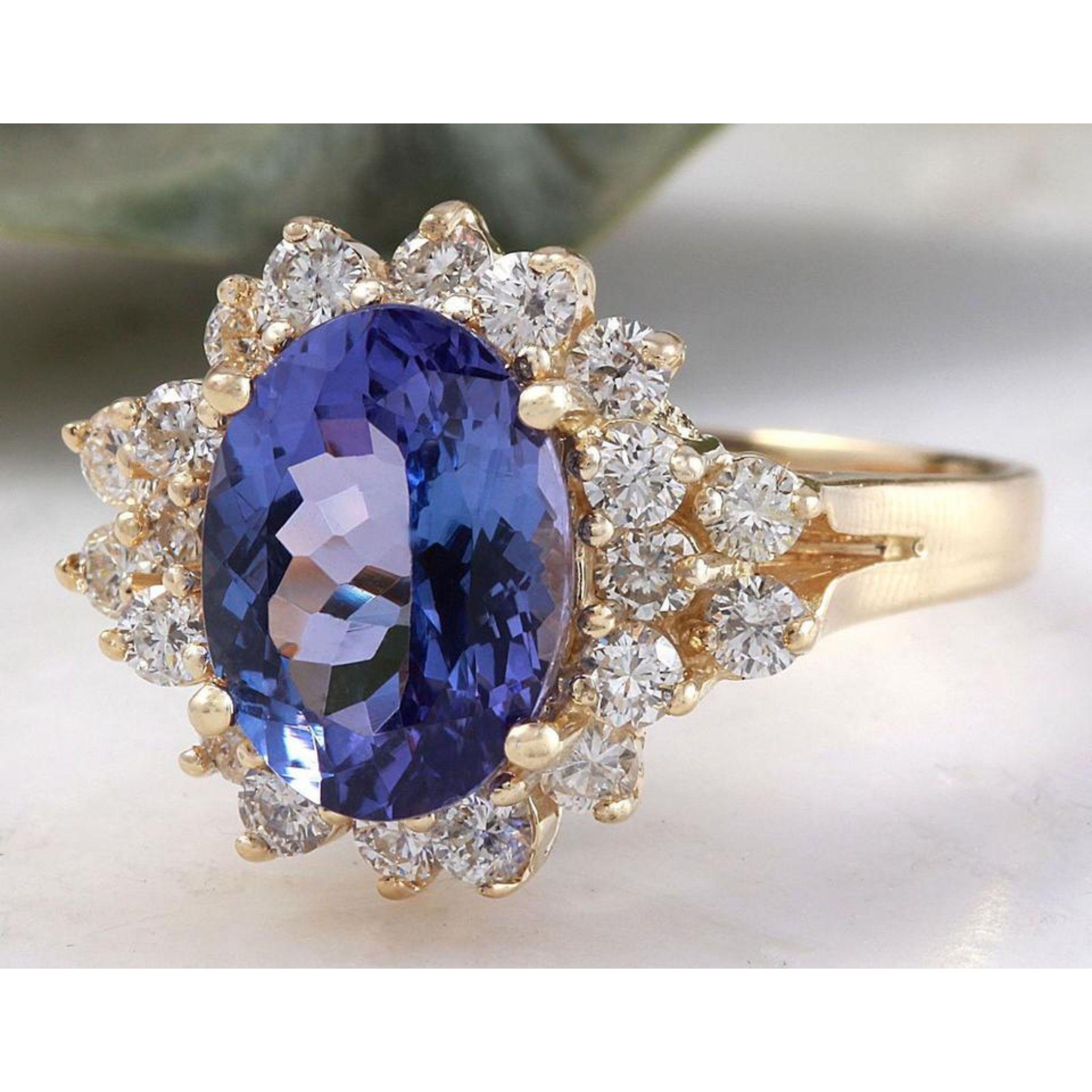 3.bague en or jaune massif 14K avec tanzanite et diamant de 84 carats de très belle qualité naturelle

Le poids total de la tanzanite ovale naturelle est de : 3.09 Carats

Aigue-marine Mesures : 10.6 x 8mm

Diamants ronds naturels Poids : .75 Carat