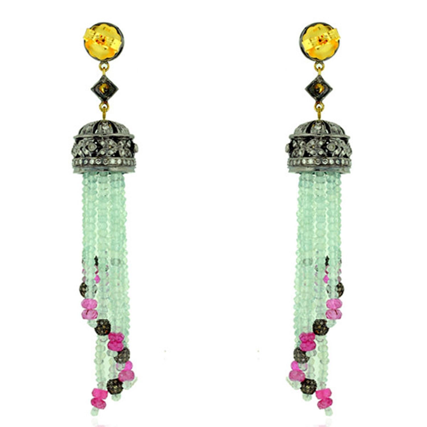 These stunning exceptional tassel earrings is handmade in 18-karat gold & sterling silver.  It is set with 38.45 carats aquamarine, 9.4 carat tourmaline and 4.92 carats of diamonds. 

FOLLOW  MEGHNA JEWELS storefront to view the latest collection &
