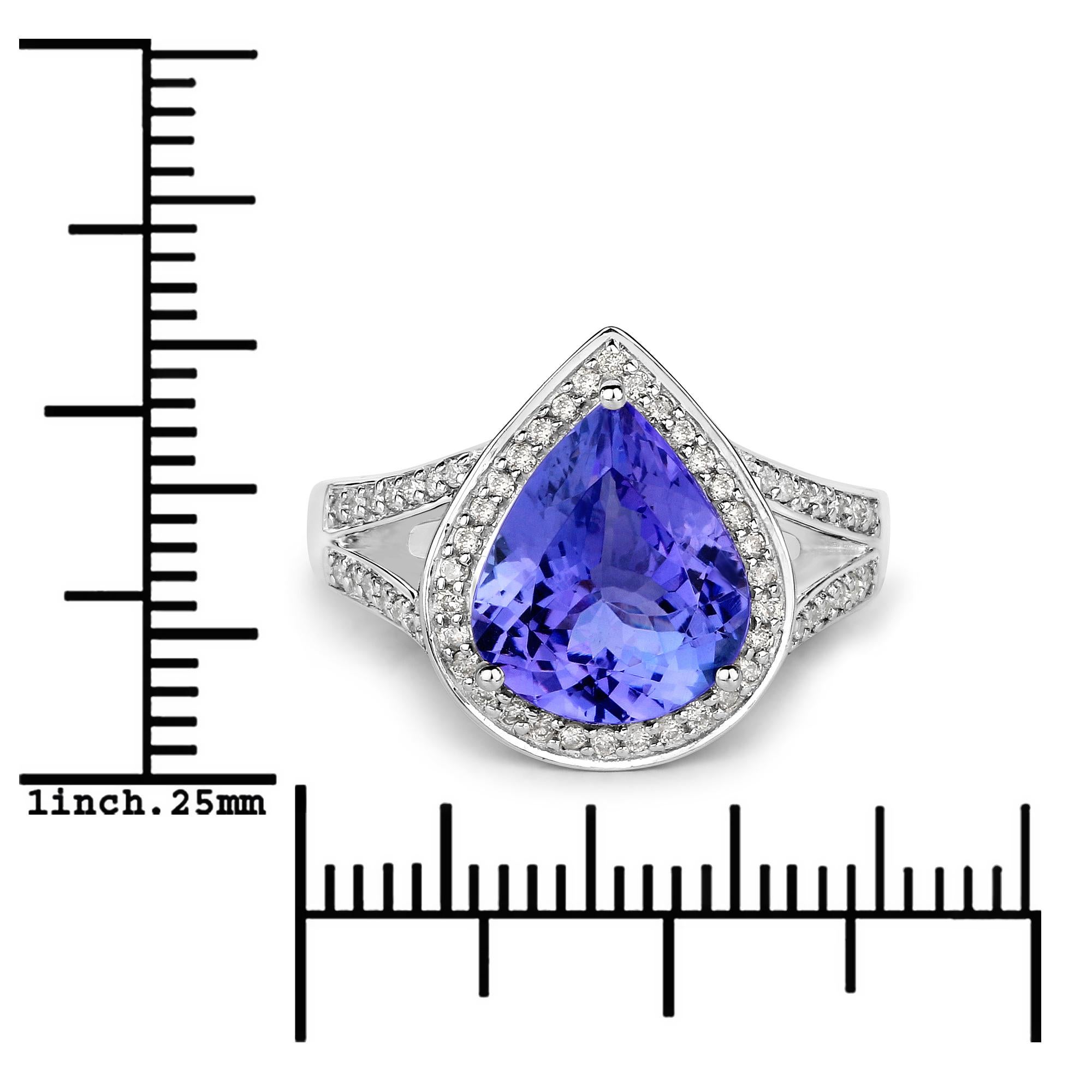 3.85 Carat Genuine Tanzanite and White Diamond 14 Karat White Gold Ring In New Condition In Great Neck, NY