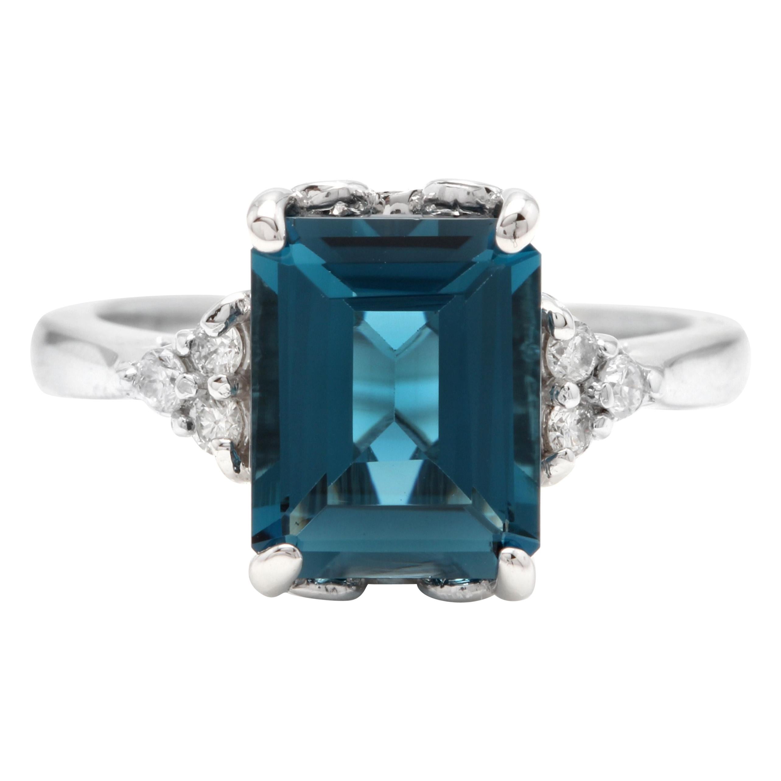 3.85 Carat Natural Impressive London Blue Topaz and Diamond 14K White Gold Ring For Sale