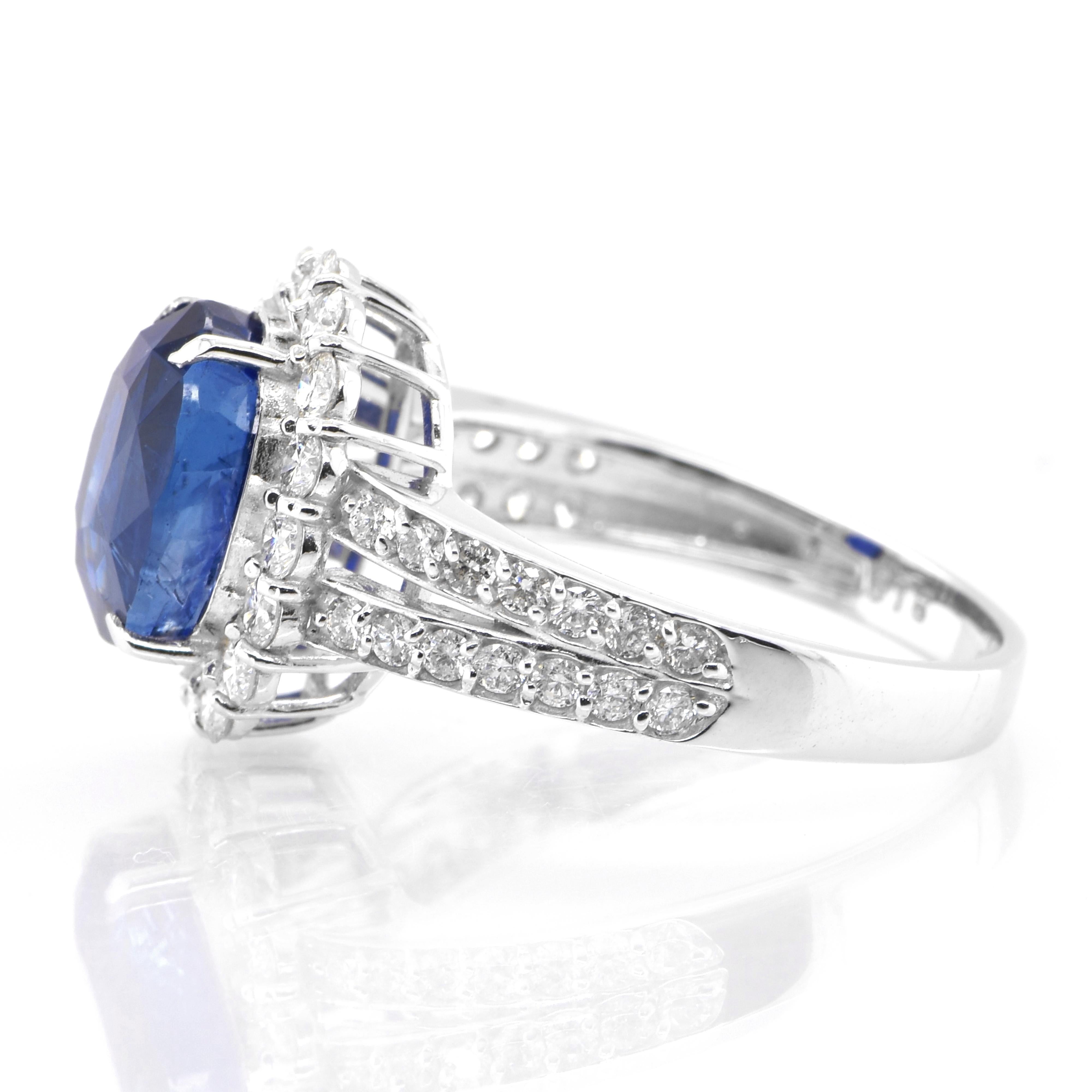 Modern 3.85 Carat Natural Sapphire and Diamond Halo Ring Set in Platinum