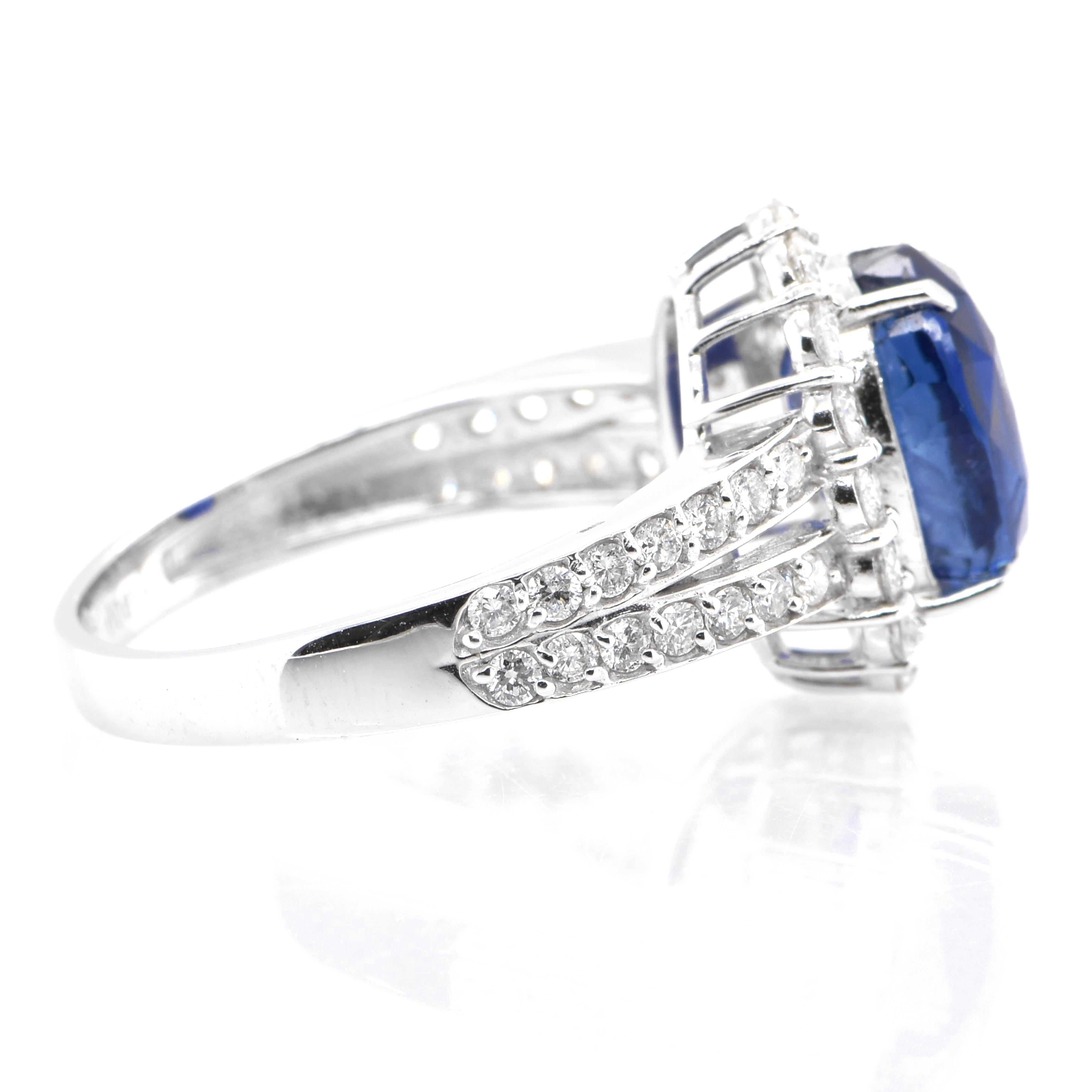 Oval Cut 3.85 Carat Natural Sapphire and Diamond Halo Ring Set in Platinum